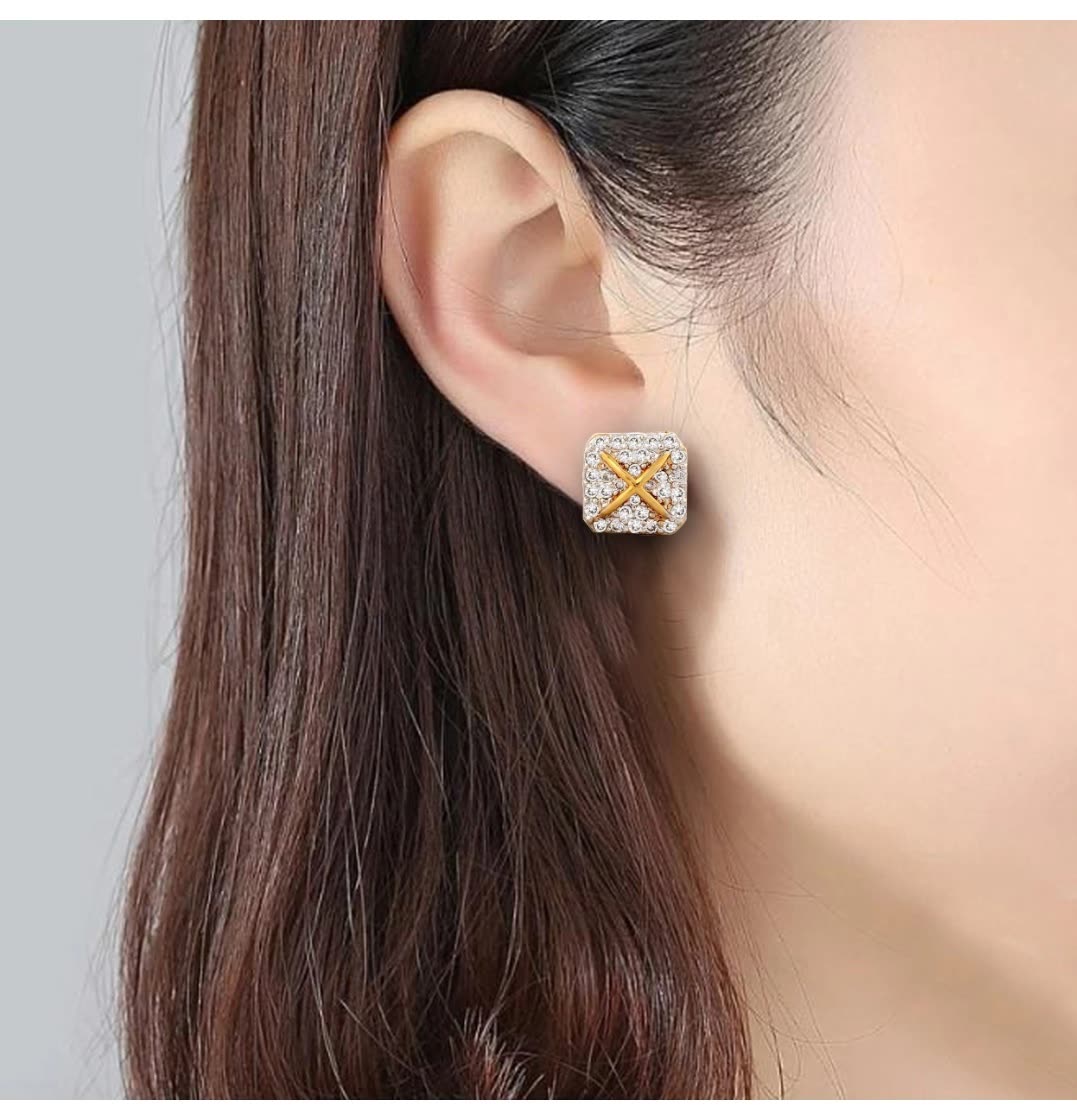 Passion Jewellers gold X stud earring, worn